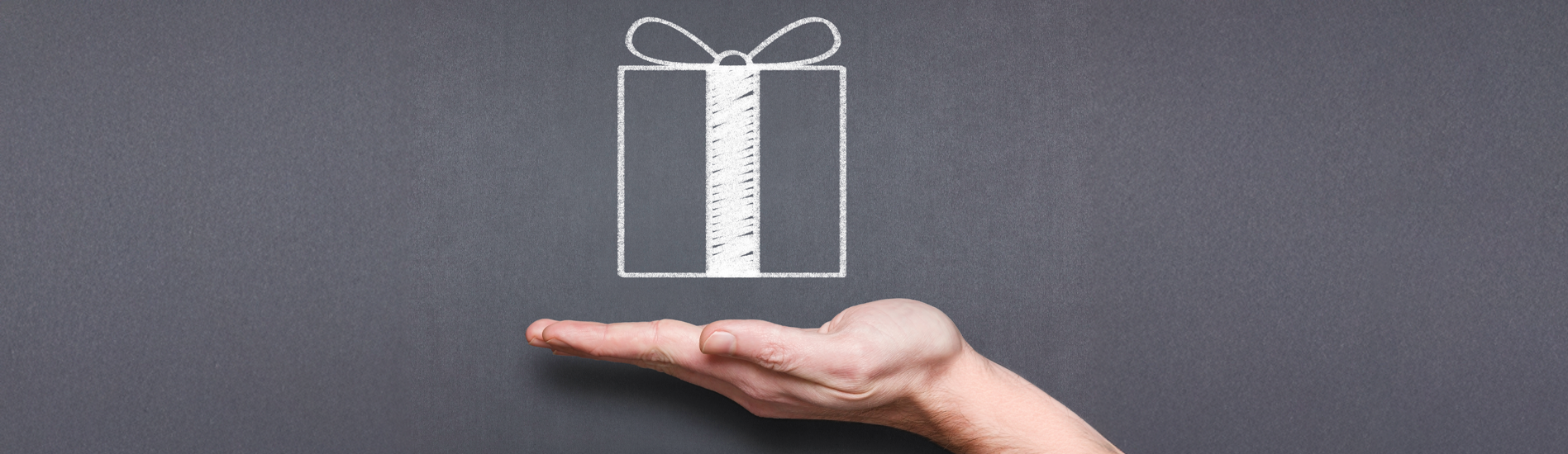 A chalkboard illustration of giving a gift
